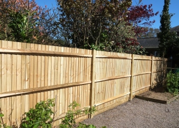 Brand new wooden shiplap boundary fence